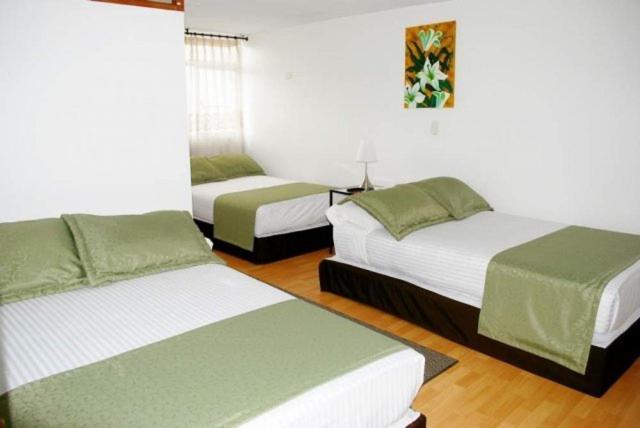 Hotel Portal De Milan مانيزاليس الغرفة الصورة