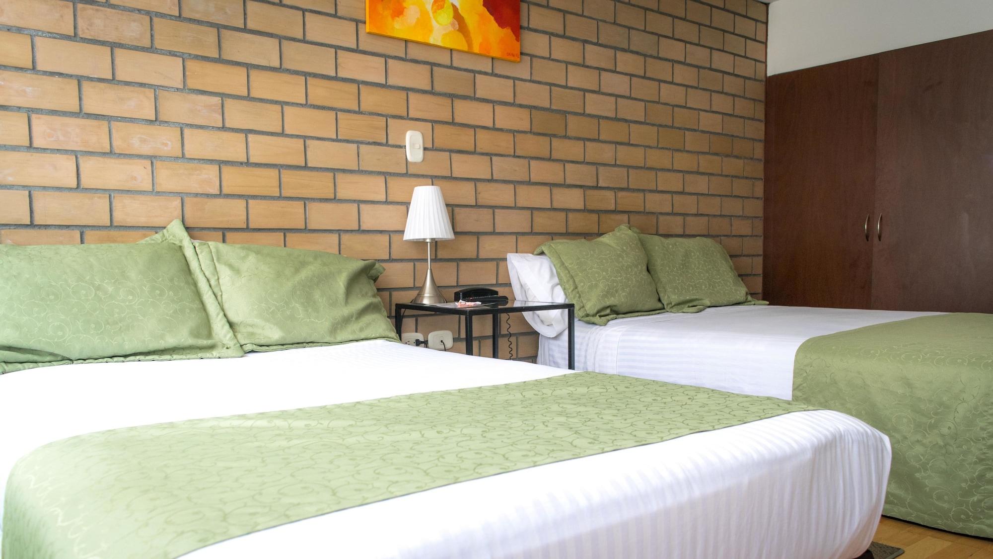 Hotel Portal De Milan مانيزاليس المظهر الخارجي الصورة