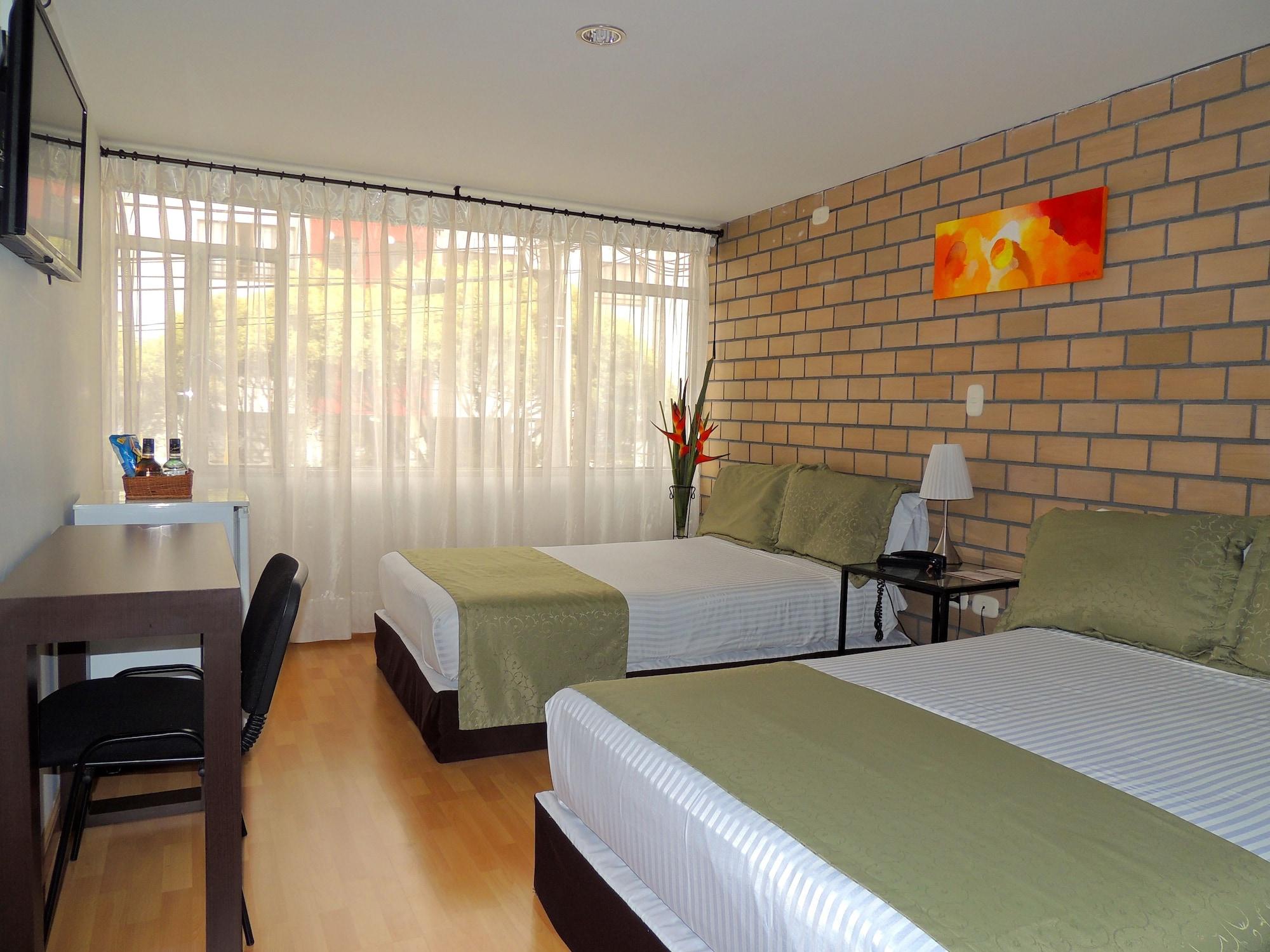 Hotel Portal De Milan مانيزاليس المظهر الخارجي الصورة