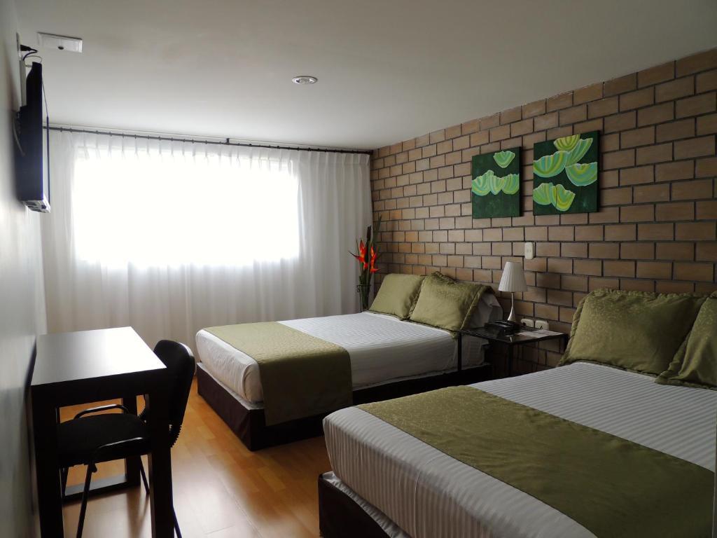 Hotel Portal De Milan مانيزاليس الغرفة الصورة