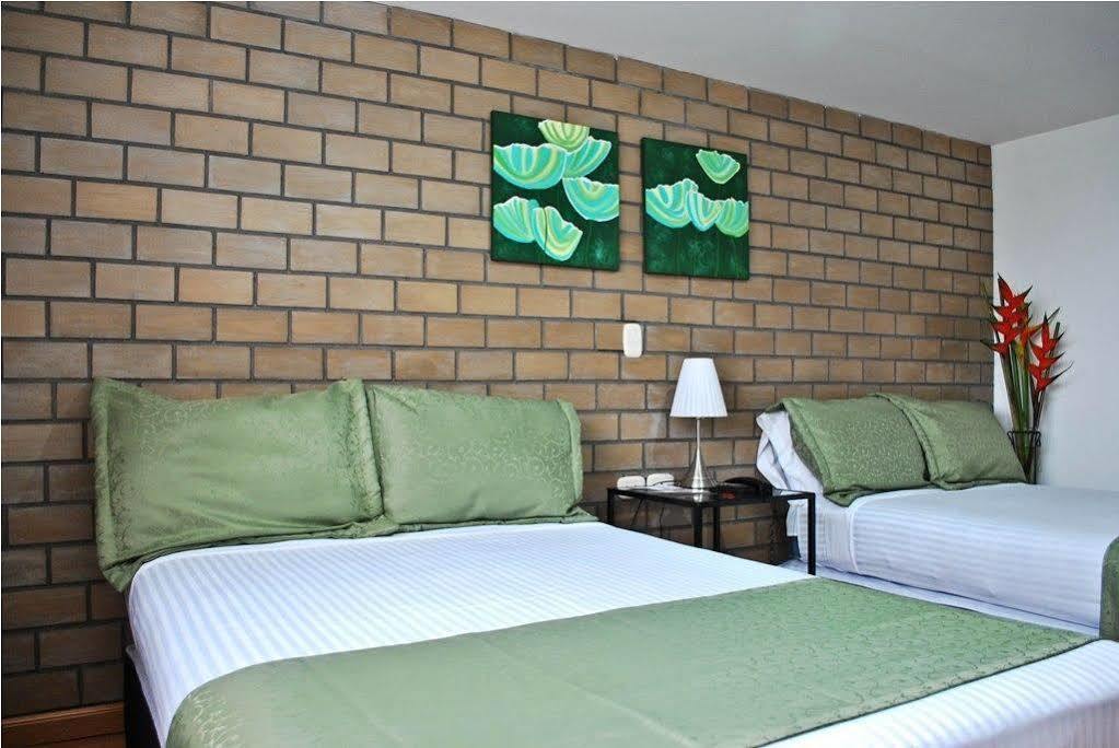 Hotel Portal De Milan مانيزاليس المظهر الخارجي الصورة